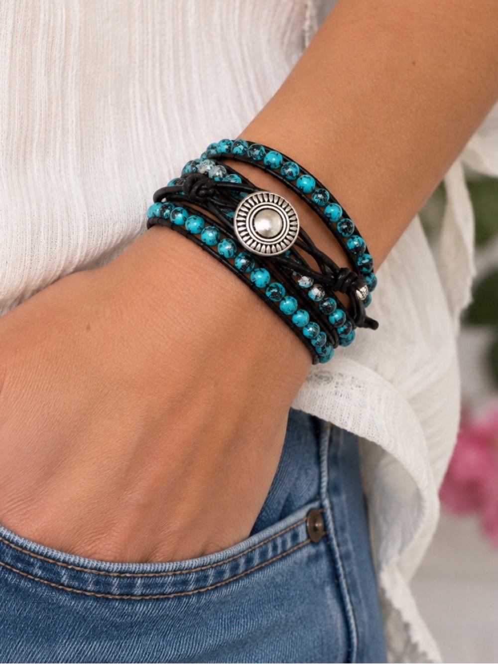 Boho-inspired multi-wrap bracelet featuring vibrant turquoise colored beads